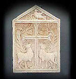 Relief showing symbolical image of Eucharistia with Cross and Lambs found in Ubli from the 5th or 6th century Relief showing symbolical image of Eucharistia with Cross and Lambs found in Ubli from the 5th or 6th century